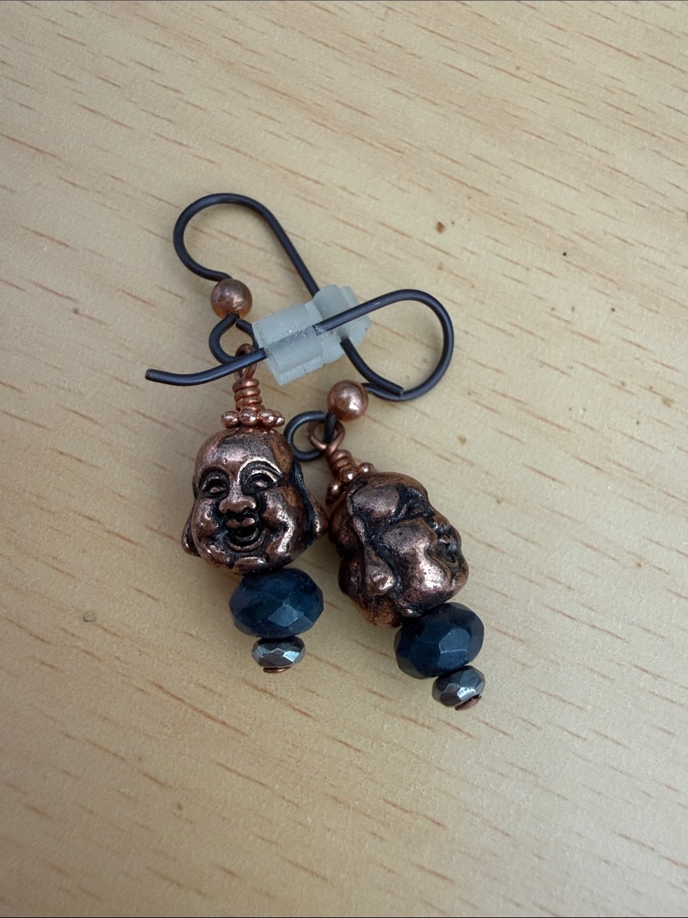 Copper Buddha Face Drop Earrings with Black Beads